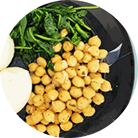 Chickpeas with wilted spinach and boiled eggs